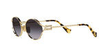 Miu Miu MU 52YS ZVN5D1 sunglasses, pale gold frame with grey gradient lenses, angled side view