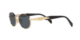 Prada PR 65ZS ZVN09T sunglasses, pale gold frame with dark grey lenses, angled side view