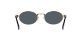Prada PR 65ZS ZVN09T sunglasses, pale gold frame with dark grey lenses, rear view