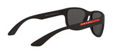 Prada Linea Rossa PS 01US DG05S0 sunglasses, black rubber frame with grey lenses, angled rear view