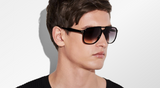 Tom Ford signature metal T logo detail